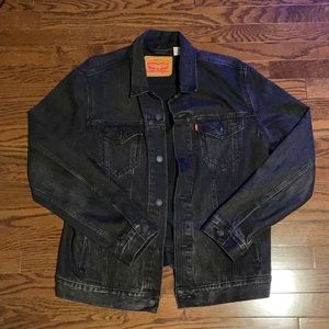 Black Levi’s jean jacket. Literally worn once. Size Large